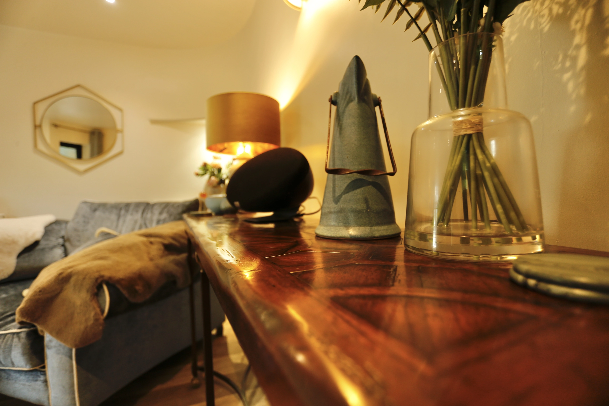 a vase of flowers on a table in a living room at Havendale Accessible Holiday Cottage