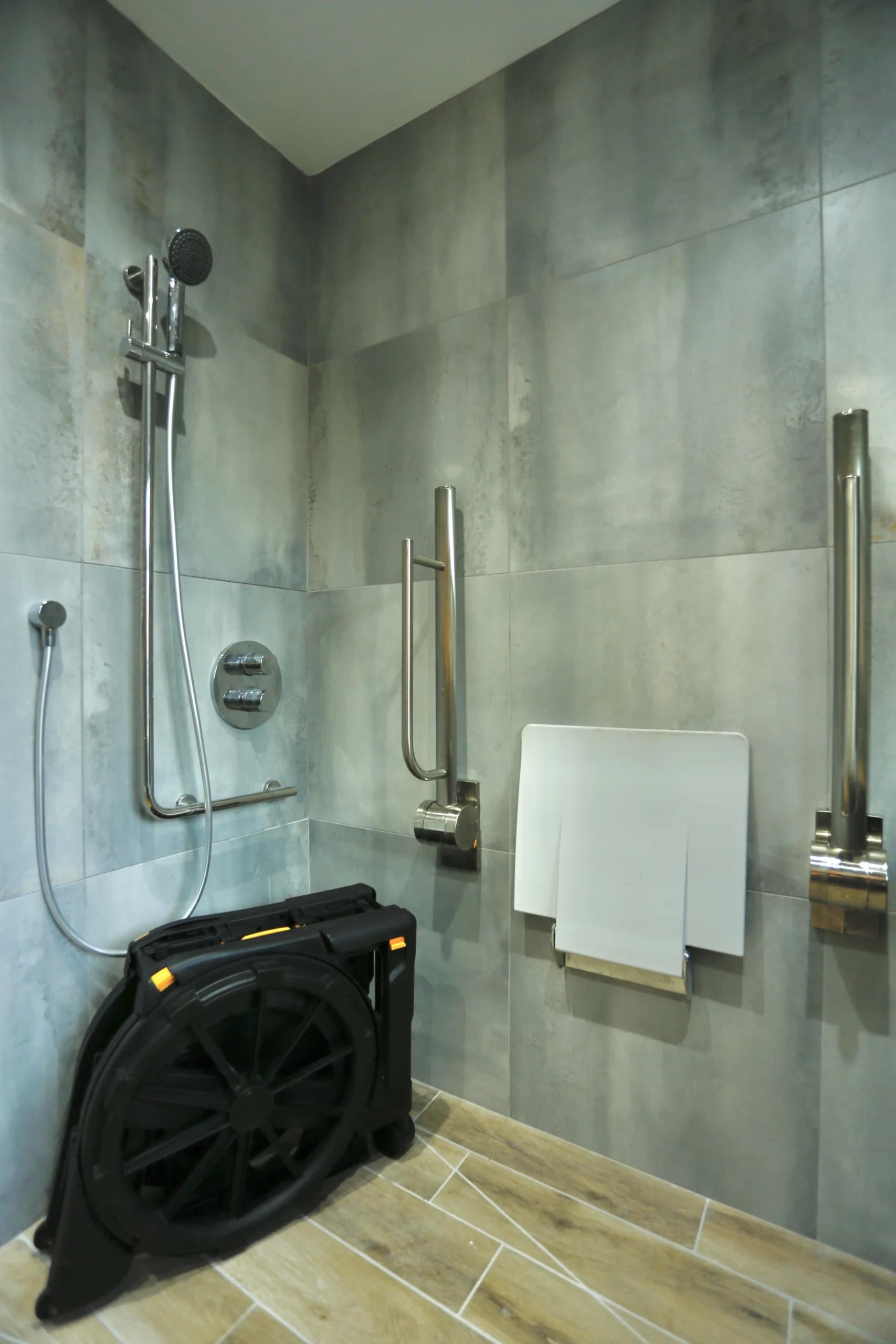 a bathroom with a toilet and a shower at Havendale Accessible Holiday Cottage