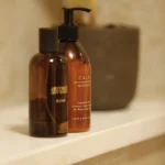 a bottle of liquid sitting on a shelf at Havendale Accessible Holiday Cottage