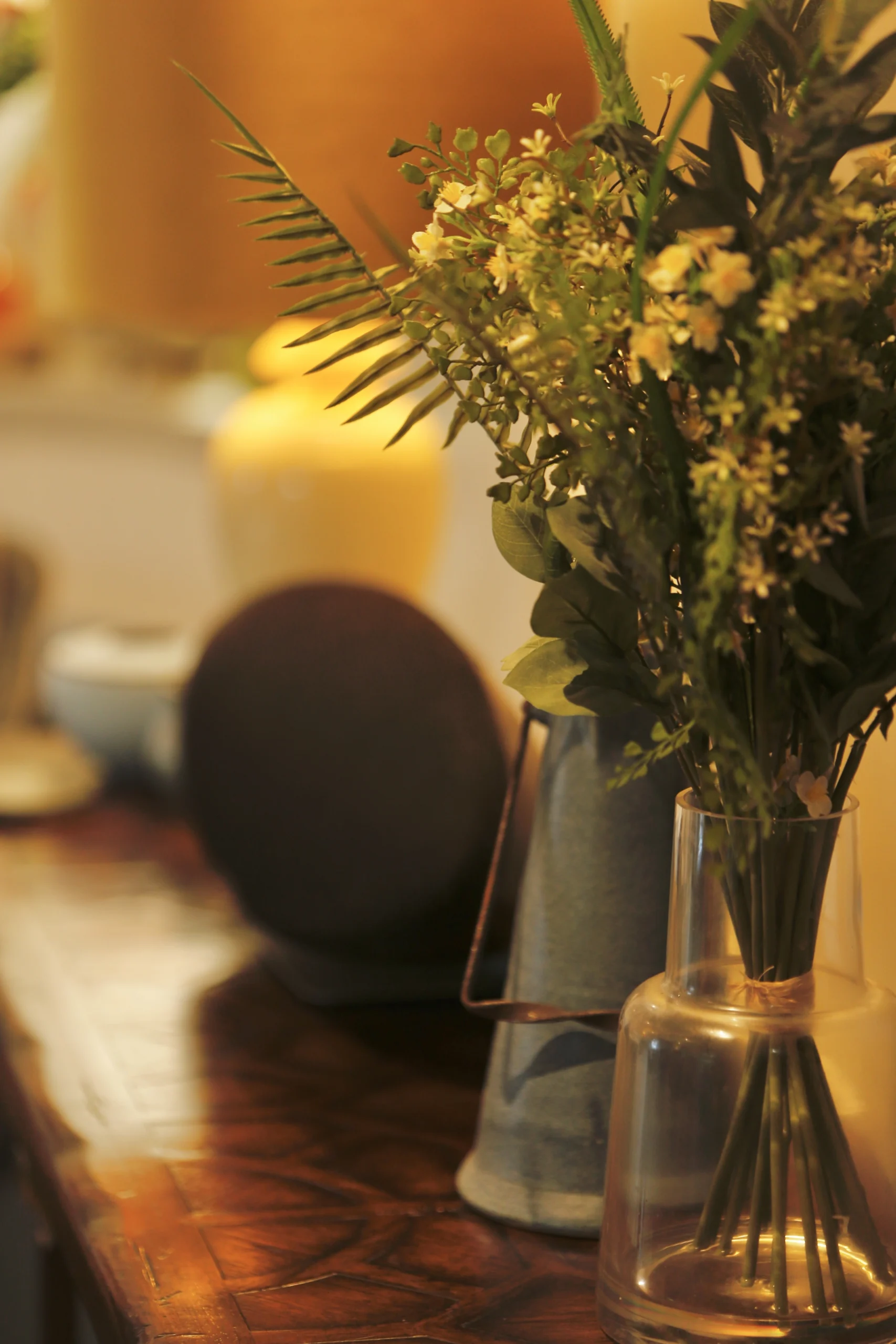 a vase with flowers on a table at Havendale Accessible Holiday Cottage