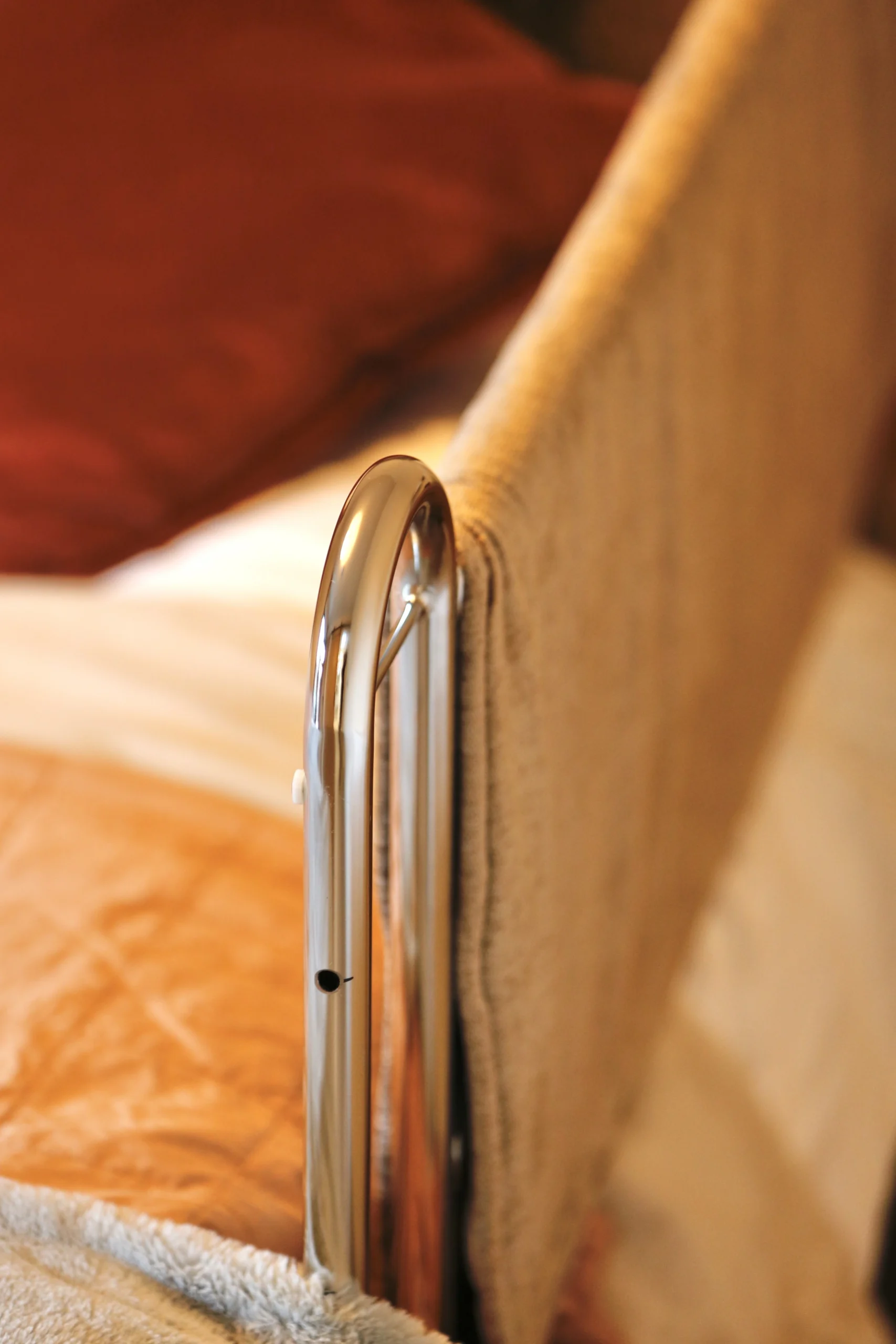 a bed with a white blanket at Havendale Accessible Holiday Cottage