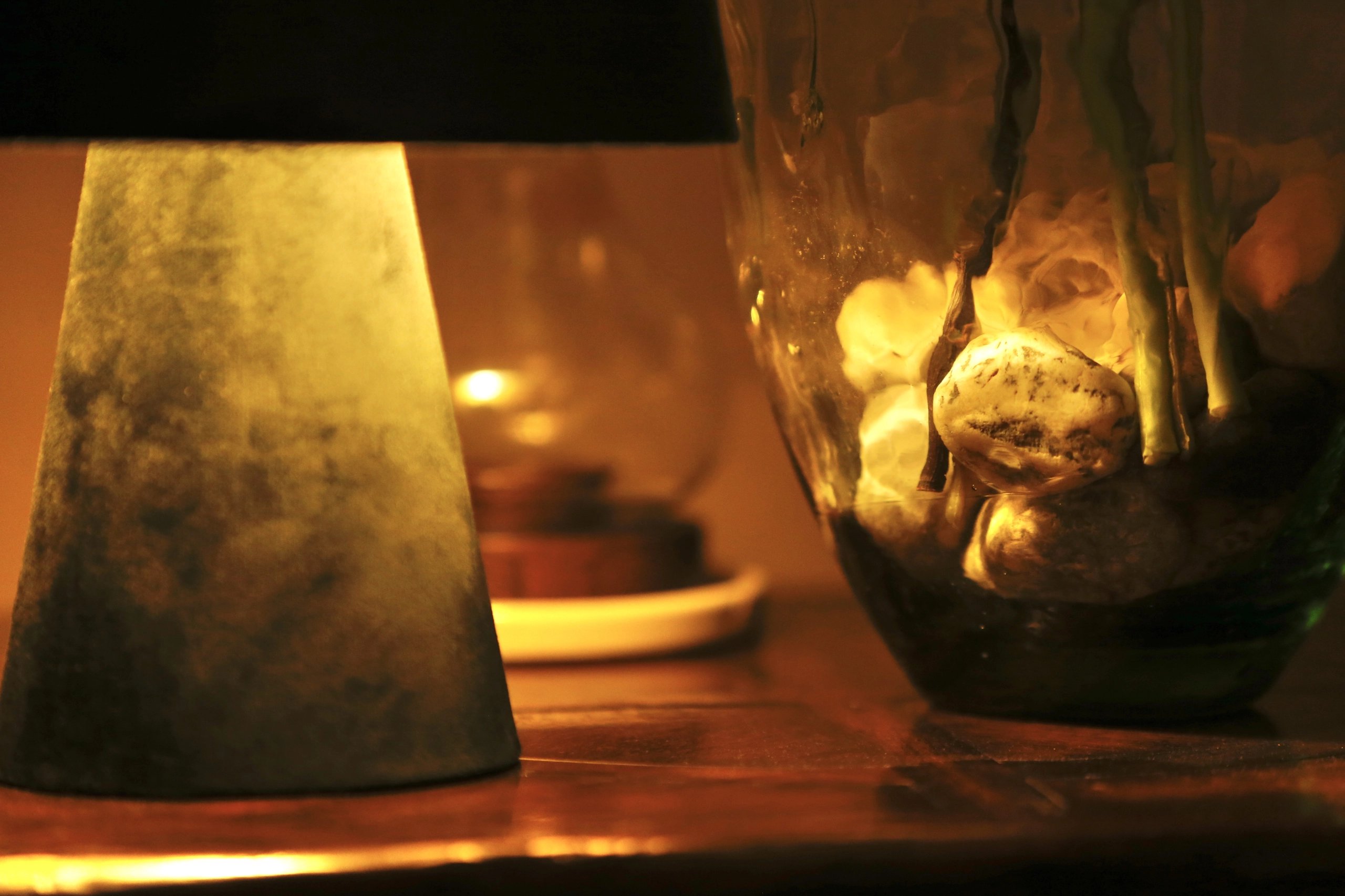 a vase with a flower inside of it at Havendale Accessible Holiday Cottage