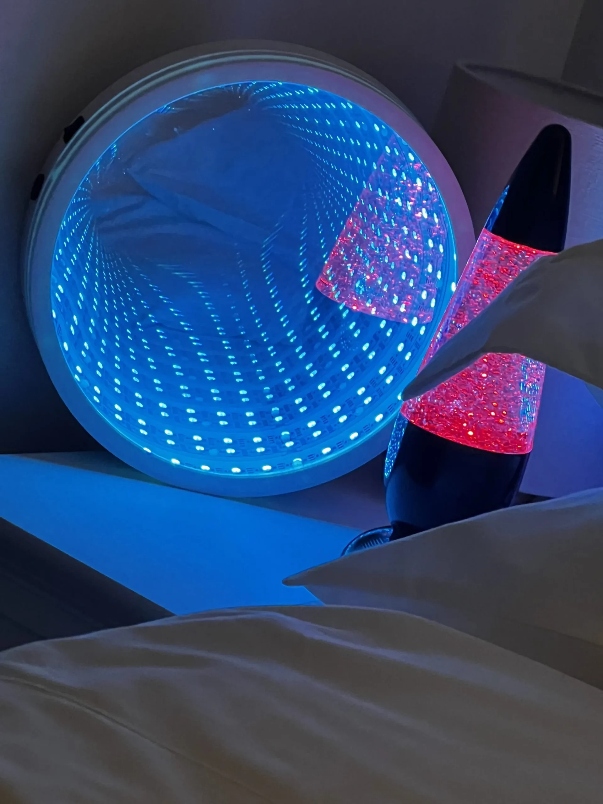 a bed with a light on it and a lamp at Havendale Accessible Holiday Cottage