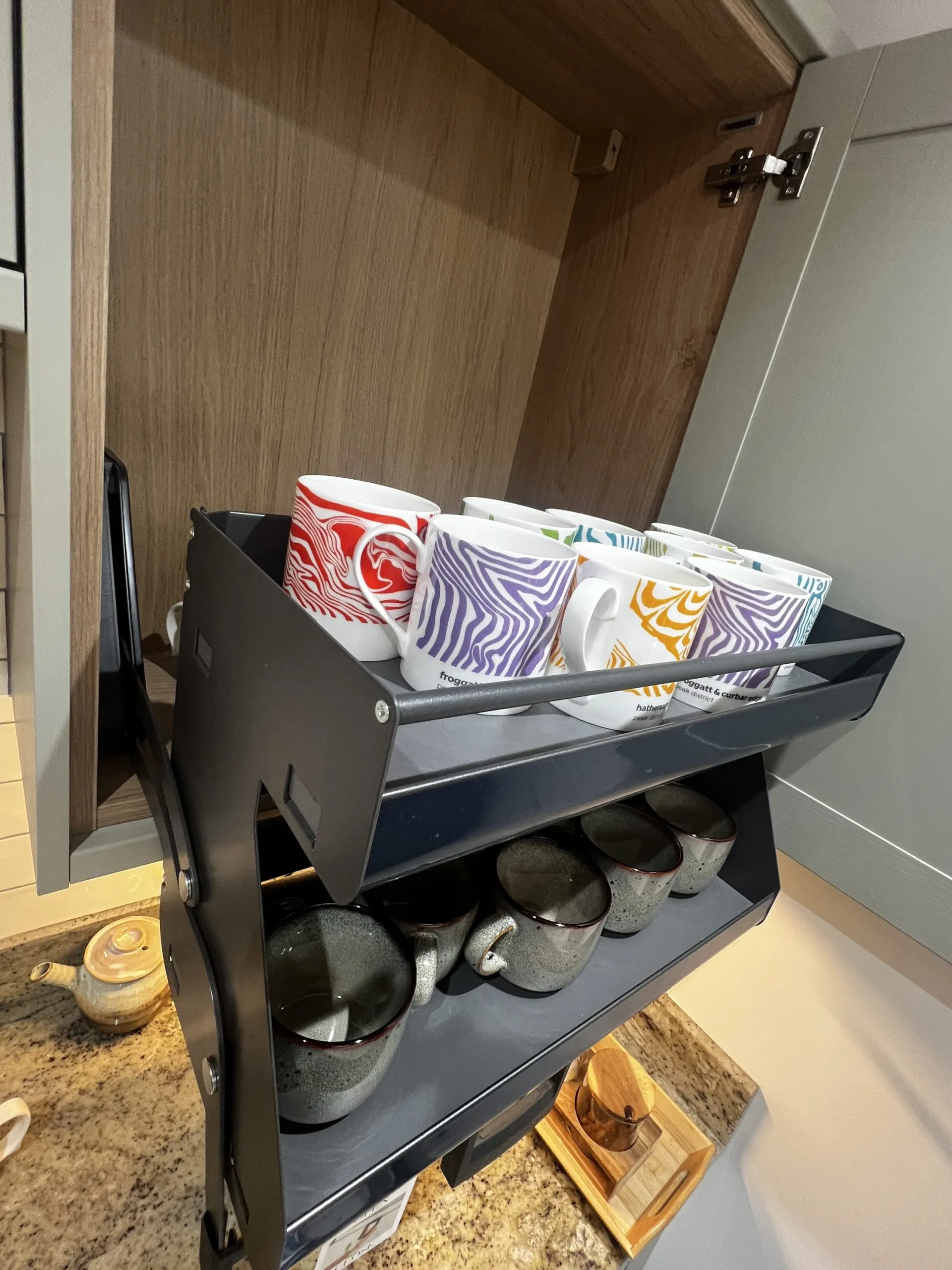 the mug storage cupboard at Havendale Accessible Holiday Cottage