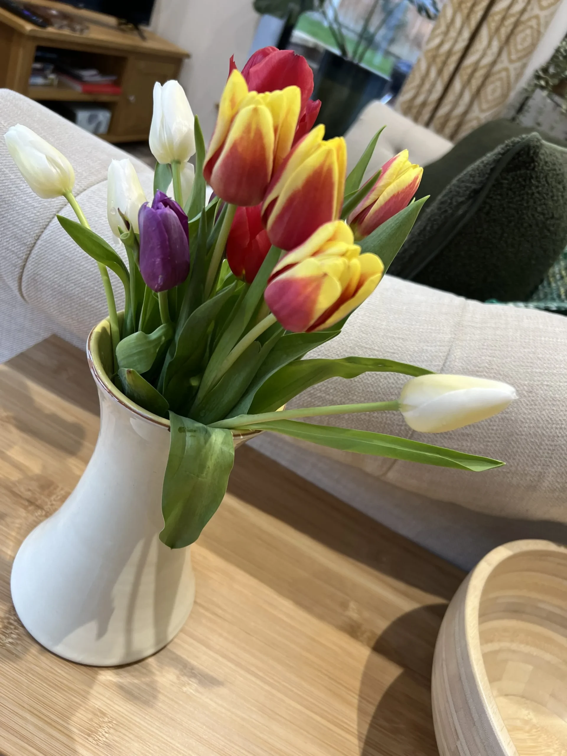 a vase of tulips at Havendale Accessible Holiday Cottage
