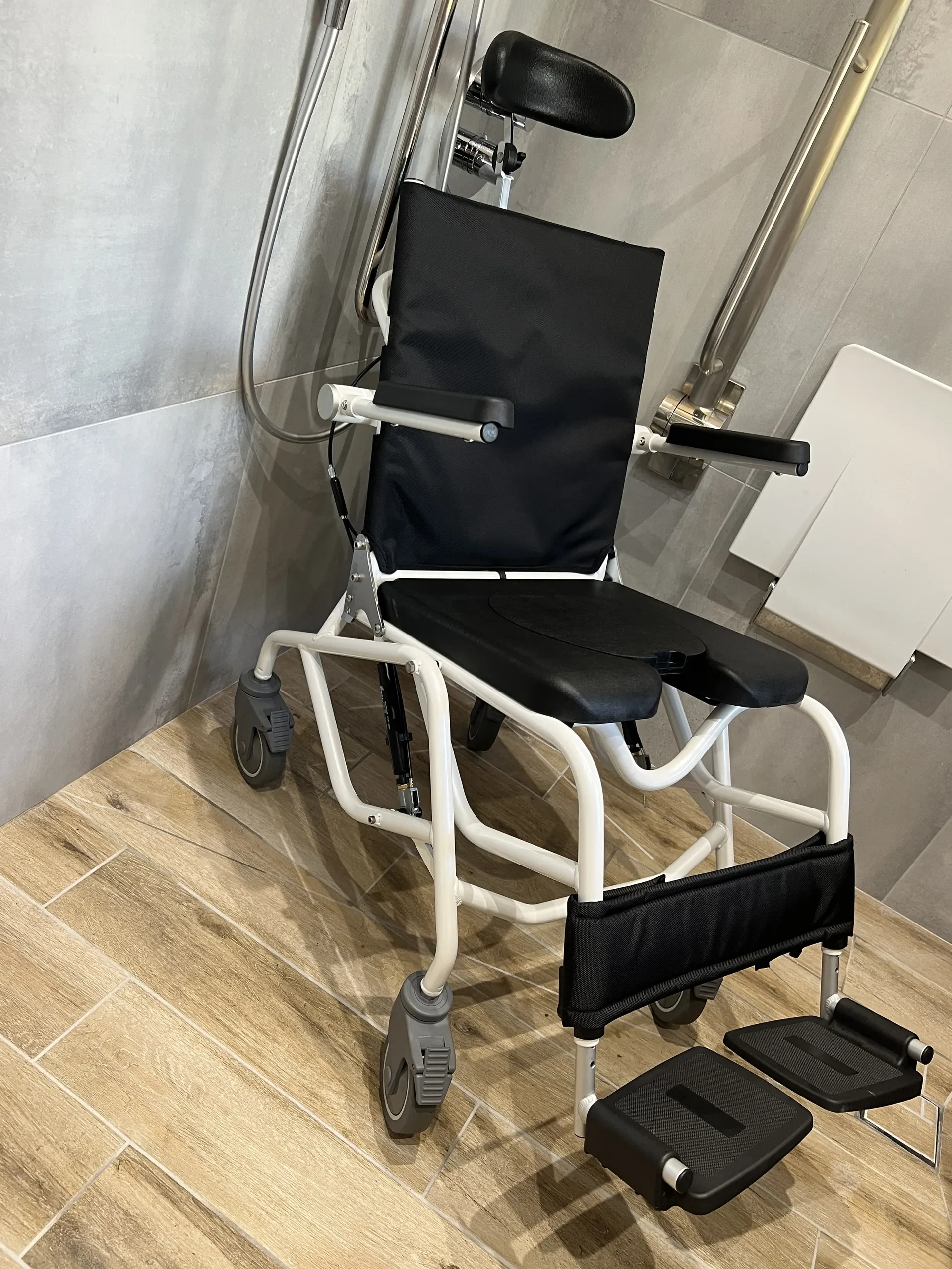 a wheelchair in a shower at Havendale Accessible Holiday Cottage