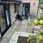 a stone patio at Havendale Accessible Holiday Cottage