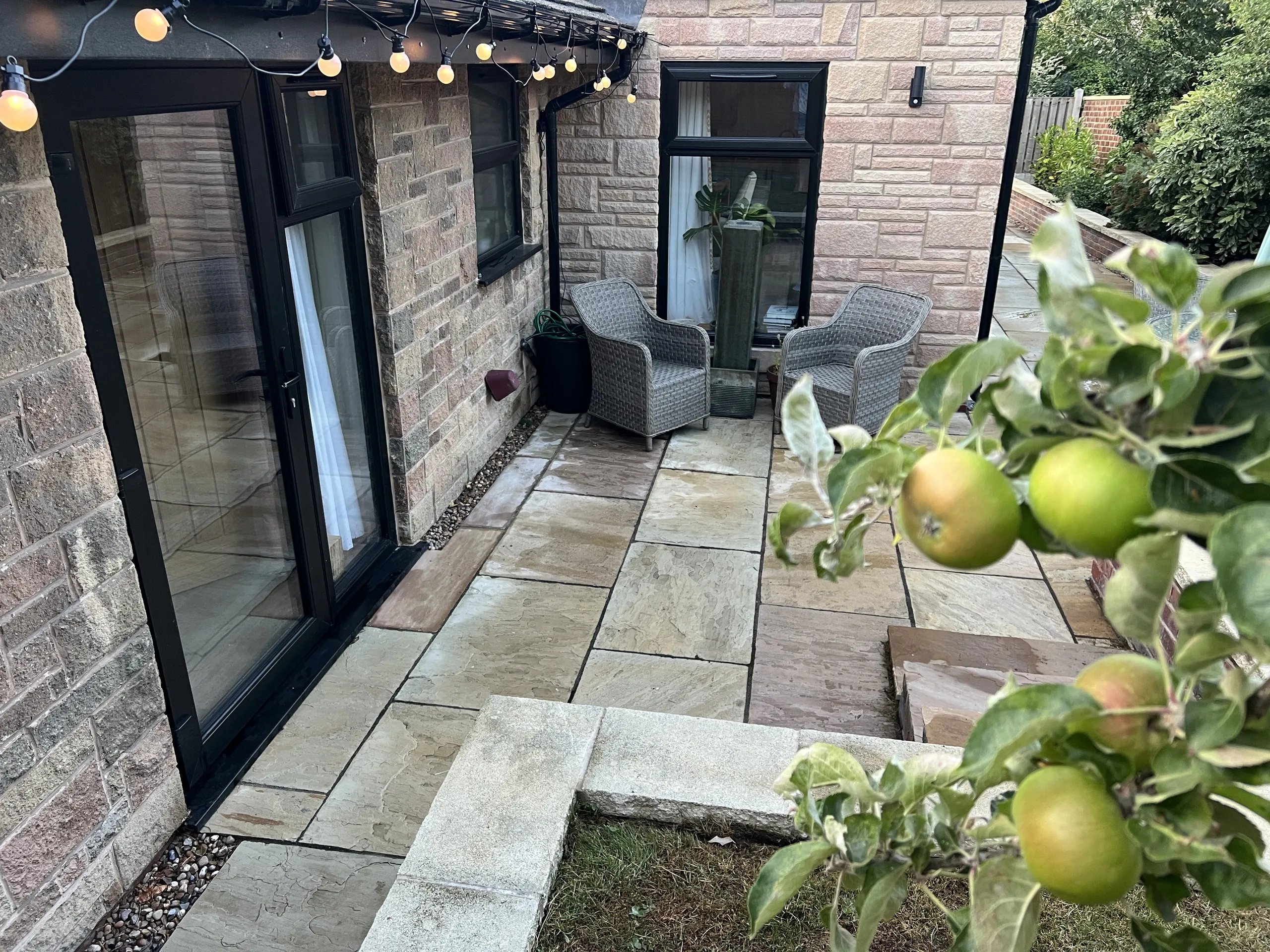 a stone patio at Havendale Accessible Holiday Cottage